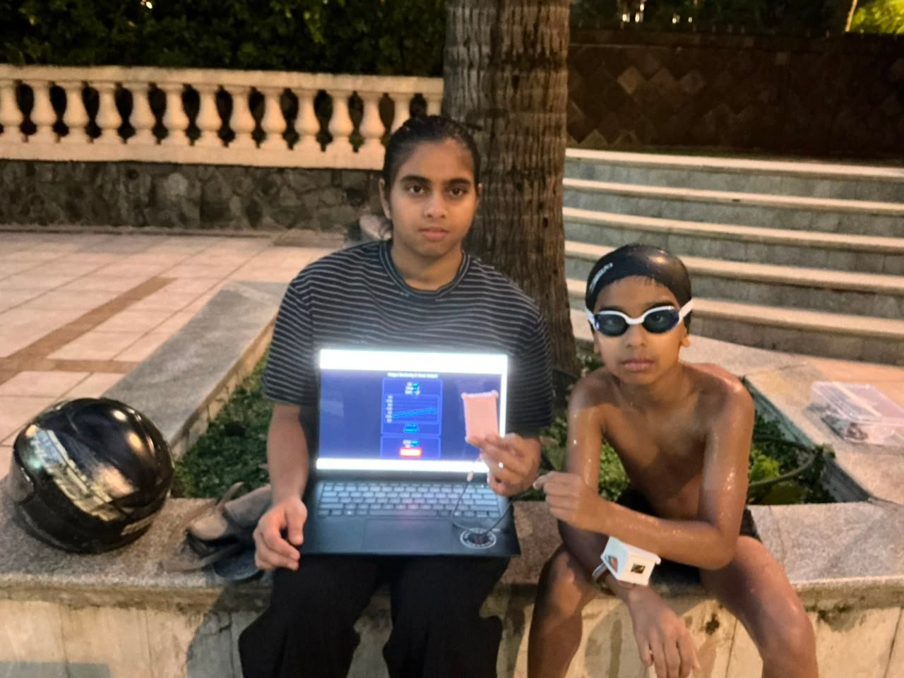 Reviewing live dashboard readings after a swim session